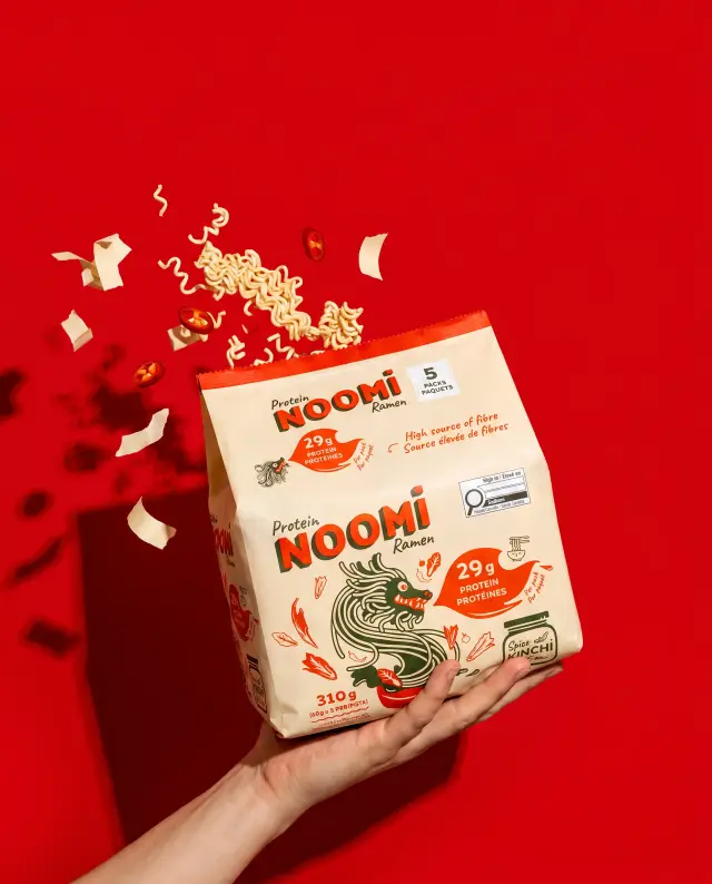 pack in hand · noodles mid-air
